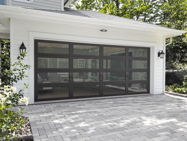 Sandy Springs Garage Door Repair design specialist presenting custom garage door options to Sandy Springs homeowner